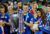 FILE - Leicester's Jamie Vardy lifts the trophy as Leicester City celebrate becoming the English Premier League soccer champions at King Power stadium in Leicester, England, Saturday, May 7, 2016. (AP Photo/Matt Dunham, File)