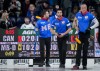 Manitoba-Dunstone skip Matt Dunstone, back left, celebrates behind third Colton Lott and second E.J. Harnden after defeating Brad Gushue's Canada rink in the playoffs at the Montana's Brier in Kelowna, B.C., on March 8, 2025. THE CANADIAN PRESS/Darryl Dyck