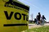 People make their way to a polling station on the day of the federal election in Ottawa, on Monday, April 28, 2025. THE CANADIAN PRESS/Spencer Colby