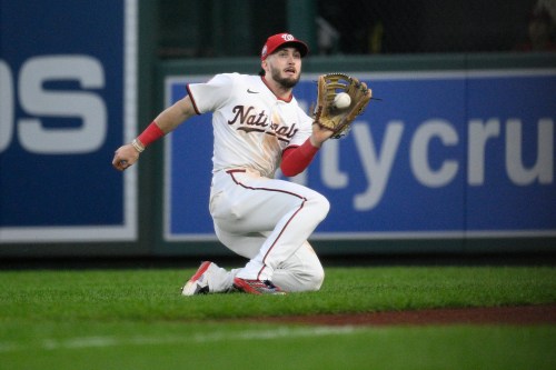FILE - Washington Nationals right fielder Dylan Crews (3) catches a line drive by Atlanta Braves' Ozzie Albies for the out during the eighth inning of a baseball game, Wednesday, Sept. 17, 2025, in Washington. (AP Photo/Nick Wass,File)