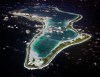 FILE - This image released by the U.S. Navy shows an aerial view of Diego Garcia in the Chagos Island group. (U.S. Navy via AP, File)