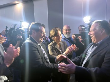 At the Coalition Avenir Québec caucus meeting on Jan. 27 in Trois-Rivières, François Legault was greeted by Bernard Drainville and Christine Fréchette, two former ministers who are vying to succeed him as party leader. THE CANADIAN PRESS/Patrice Bergeron
