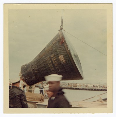 This 1966 image taken by Ron McQueeney shows the Gemini 8 spacecraft being lifted for transport at Naha Air Base in Okinawa, Japan. (Ron McQueeney/Ohio History Connection via AP)