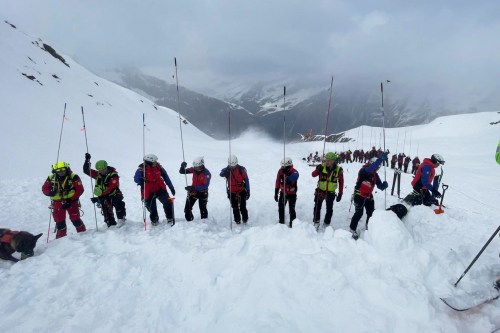Rescuers search on the site where an avalanche broke loose in Val Ridanna, in Alto Adige, northern Italy, engulfing a group of 10 skiers Saturday, March 21, 2026. (Italian Alpine the National Alpine and Speleological Rescue Corps Trentino Via AP)