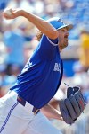 Toronto Blue Jays' Kevin Gausman (34) pitches to Canada during the first inning of an exhibition baseball game Tuesday, March 3, 2026, in Dunedin, Fla. (AP Photo/Chris O'Meara)