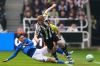 Sunderland's Chris Rigg, left, and Newcastle United's Lewis Hall battle for the ball during the Premier League match between Newcastle and Sunderland outside St James' Park, Newcastle upon Tyne, England, Sunday March 22, 2026. (Owen Humphreys/PA via AP)