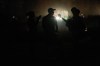 People spend the dark on the Malecon during a blackout in Havana, Cuba, Saturday, March 21, 2026. (AP Photo/Ramon Espinosa)