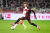 Stuttgart's Finn Jeltsch, left, and Leipzig's Yan Diomande fight for the ball during the Bundesliga soccer match between VfB Stuttgart and RB Leipzig in Stuttgart, Germany, Sunday March 15, 2026. (Harry Langer/dpa via AP)