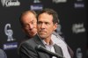 FILE - Colorado Rockies new president of baseball operations, Paul DePodesta, front, responds to questions as Dick Monfort, chairman and chief executive officer of the team, looks on during a news conference to introduce DePodesta Thursday, Nov. 13, 2025, in Denver. (AP Photo/David Zalubowski, File)