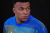 Real Madrid's Kylian Mbappe looks on before the Spanish La Liga soccer match between Real Madrid and Atletico Madrid in Madrid, Spain, Sunday, March 22, 2026. (AP Photo/Manu Fernandez)