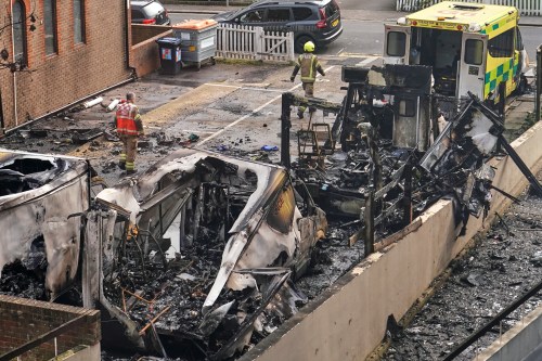 View at burnt ambulances in a car park at Golders Green in London, Monday, March 23, 2026 after an apparent arson attack on four vehicles belonging to a Jewish ambulance service, Hatzola Northwest.(AP Photo/Alberto Pezzali)