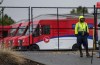 A striking Canada Post worker stands at a picket line outside a delivery depot, in Burnaby, B.C., on Monday, September 29, 2025. THE CANADIAN PRESS/Darryl Dyck