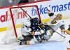 Winnipeg Jets' Brad Lambert (93) collides with Vegas Golden Knights goaltender Adin Hill (33) as Jeremy Lauzon (5) defends during the third period of their NHL hockey game in Winnipeg, Tuesday, March 24, 2026. THE CANADIAN PRESS/Fred Greenslade