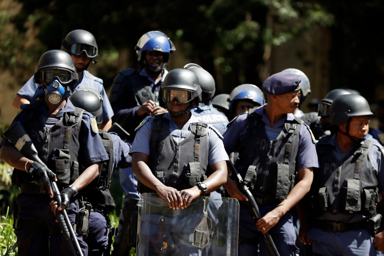 South Africa’s top police officer faces charges in a widening ...