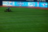 A member of the grounds crew attends to the turf in the outfield during a media tour of Rogers Centre ahead of the Blue Jays' 50th season opener in Toronto on March 24, 2026. THE CANADIAN PRESS/Cole Burston