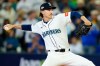 FILE - Seattle Mariners pitcher Bryce Miller works against the Toronto Blue Jays during the first inning in Game 5 of baseball's American League Championship Series in Seattle, Friday, Oct. 17, 2025. (Frank Gunn/The Canadian Press via AP, File)