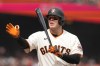 FILE -San Francisco Giants' Roberto Perez calls time out against the Kansas City Royals during the fifth inning of a baseball game in San Francisco, April 7, 2023. (AP Photo/Eric Risberg, File)