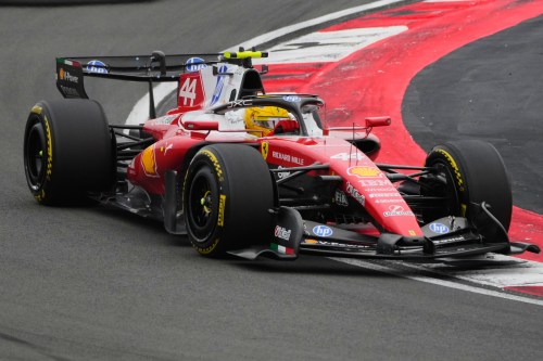 Ferrari driver Lewis Hamilton of Britain steers his car during the Chinese Formula One Grand Prix race at the Shanghai International Circuit, in Shanghai, China, Sunday, March 15, 2026. (AP Photo/Vincent Thian)