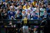 The crowd cheers and jeers as Pittsburgh Pirates pitcher Paul Skenes (30) exits the field after he was relieved in the first inning of an opening-day baseball game against the New York Mets, Thursday, March 26, 2026, in New York. (AP Photo/Angelina Katsanis)