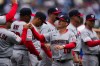Washington Nationals manager Blake Butera (10) greets his team before an opening-day baseball game against the Chicago Cubs, Thursday, March 26, 2026, in Chicago. (AP Photo/Erin Hooley)