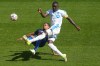 FC Cincinnati defender Miles Robinson, left, tackles CF Montréal forward Prince Osei Owusu, right, inside the penalty box, drawing a foul, during the second half of an MLS soccer match, Sunday, March 22, 2026, in Cincinnati. (AP Photo/Kareem Elgazzar)