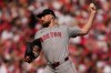 Boston Red Sox pitcher Garrett Crochet throws during the second inning of an opening-day baseball game against the Cincinnati Reds in Cincinnati, Thursday, March 26, 2026. (AP Photo/Carolyn Kaster)