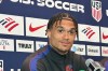 Unites States' Antonee Robinson listens during a news conference before the men's national soccer team training, Friday, March 27, 2026, in Marietta, Ga. (AP Photo/Ronald Blum