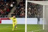 Switzerland's goalkeeper Gregor Kobel watches the ball go into the net for Germany's fourth goal during an international friendly soccer match between Switzerland and Germany in Basel, Switzerland, Friday, March 27, 2026. (Claudio Thoma/Keystone via AP)