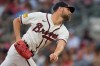 Atlanta Braves pitcher Chris Sale (51) deliveres in the first inning of an opening-day baseball game against the Kansas City Royals, Friday, March 27, 2026, in Atlanta. (AP Photo/Mike Stewart)