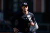 New York Yankees' Aaron Judge jogs on the field while warming up before a baseball game against the San Francisco Giants in San Francisco, Saturday, March 28, 2026. (AP Photo/Jeff Chiu)