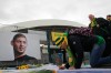 FILE - Supporters gather to pay tribute to Argentinian soccer player Emiliano Sala prior the French League One soccer match between Nantes against Bordeaux at La Beaujoire stadium in Nantes, western France, Sunday, Jan. 26, 2020. (AP Photo/Michel Euler, file)