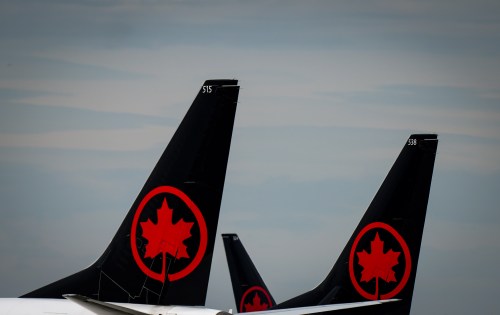Air Canada Boeing 737 MAX 8 aircraft sit parked at Vancouver International Airport, in Richmond, B.C., on Monday, Aug. 18, 2025. THE CANADIAN PRESS/Darryl Dyck
