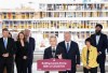 Prime Minister Mark Carney, centre, makes an announcement regarding housing and affordability at a new condo development in Toronto on Monday, March 30, 2026. THE CANADIAN PRESS/Nathan Denette
