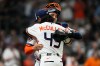 Houston Astros starting pitcher Lance McCullers Jr. (43) celebrates with catcher Yainer Diaz (21) after the top of the seventh inning of a baseball game against the Boston Red Sox in Houston, Monday, March 30, 2026. (AP Photo/Ashley Landis)