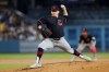 Cleveland Guardians starting pitcher Parker Messick (77) releases a pitch during the first inning of a baseball game against the Los Angeles Dodgers, Monday, March 30, 2026, in Los Angeles. (AP Photo/Caroline Brehman)