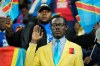 FILE - Michel Nkuka Mboladinga, a DR Congo fan impersonating late Congolese leader Patrice Lumumba, strikes a pose during the Africa Cup of Nations group D soccer match between Botswana and DR Congo in Rabat, Morocco, Tuesday, Dec. 30, 2025. (AP Photo/Mosa'ab Elshamy, File)