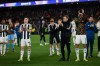 Newcastle's coach Eddie Howe, second right, applauds the fans of his team after the Champions League round of 16, second leg soccer match between FC Barcelona and Newcastle United FC in Barcelona, Spain, Wednesday, March 18, 2026. (AP Photo/Joan Monfort)