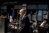 Prime Minister Mark Carney walks around a Toronto neighbourhood after visiting a local business on Monday, March 30, 2026. THE CANADIAN PRESS/Nathan Denette
