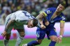 Italy's Gianluca Mancini, left, and Bosnia's Ermedin Demirovic tussle during the World Cup qualifying playoff final soccer match between Bosnia and Italy in Zenica, Bosnia, Tuesday, March 31, 2026. (AP Photo/Armin Durgut)