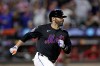 FILE - New York Mets designated hitter J.D. Martinez watches his run scoring a single during the sixth inning of a baseball game against the Cincinnati Reds on Sept. 6, 2024, in New York. (AP Photo/Adam Hunger, File)