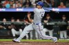 Texas Rangers' Corey Seager hits an RBI single during the fifth inning of a baseball game against the Baltimore Orioles, Tuesday, March 31, 2026, in Baltimore. (AP Photo/Stephanie Scarbrough)