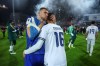 Bosnia's Edin Dzeko, left, greets Italy's Bryan Cristante after a penalty shootout during the World Cup qualifying playoff final soccer match between Bosnia and Italy in Zenica, Bosnia, Tuesday, March 31, 2026. (AP Photo/Armin Durgut)