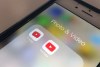 FILE - The icons for the YouTube Kids and YouTube apps are displayed on a smartphone in New York on April 25, 2018. (AP Photo/Jenny Kane, File)