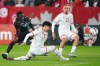 Canada's Tani Oluwaseyi (left) shoots as Tunisia's Alaa Ghram (18) and Moutaz Neffati (21) defend during first half International friendly action in Toronto, on Tuesday, March 31, 2026. THE CANADIAN PRESS/Chris Young