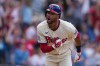 Philadelphia Phillies' Justin Crawford reacts after hitting a one run-single off of Washington Nationals pitcher Cole Henry during the tenth inning of a baseball game, Wednesday, April 1, 2026, in Philadelphia. (AP Photo/Matt Rourke)