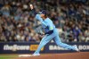 Toronto Blue Jays pitcher Kevin Gausman (34) throws a pitch against the Colorado Rockies during first inning MLB baseball action in Toronto on Wednesday, April 1, 2026. THE CANADIAN PRESS/Nathan Denette
