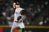 New York Yankees starting pitcher Cam Schlittler throws against the Seattle Mariners during the first inning of a baseball game, Wednesday, April 1, 2026, in Seattle. (AP Photo/Lindsey Wasson)
