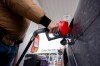 A person fills up their car at a gas station in Montreal on Thursday, March 5, 2026. THE CANADIAN PRESS/Christopher Katsarov