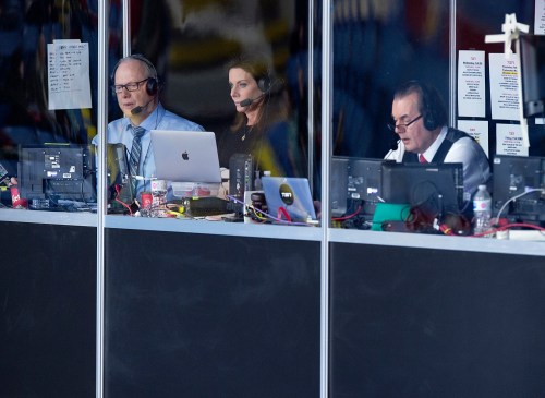 Former curling great Russ Howard, left, Vic Rauter, right, and Olympic curling silver medallist Cheryl Bernard, the TSN team at the Scotties Tournament of Hearts, call the action from the broadcast booth at Centre 200 in Sydney, N.S. on Tuesday, Feb. 19, 2019. THE CANADIAN PRESS/Andrew Vaughan
