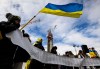 People rally on Parliament Hill to mark the 3rd anniversary of Russia's full-scale invasion of Ukraine, in Ottawa, on Feb. 23, 2025. THE CANADIAN PRESS/Justin Tang